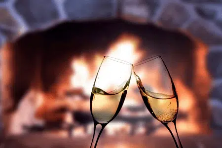 Celebrate love by the fire with romantic cabin ideas for cozy evenings and shared drinks